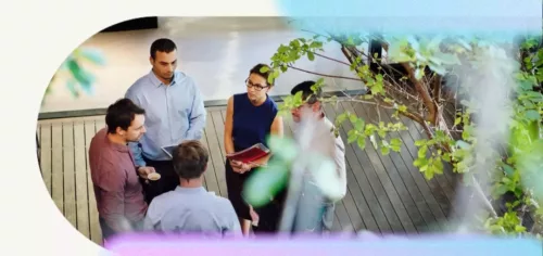 Image of diverse individuals discussing best practices in ESG and risk management